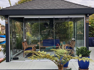 What Are The Functions And Characteristics Of Frameless Glass Folding Doors?